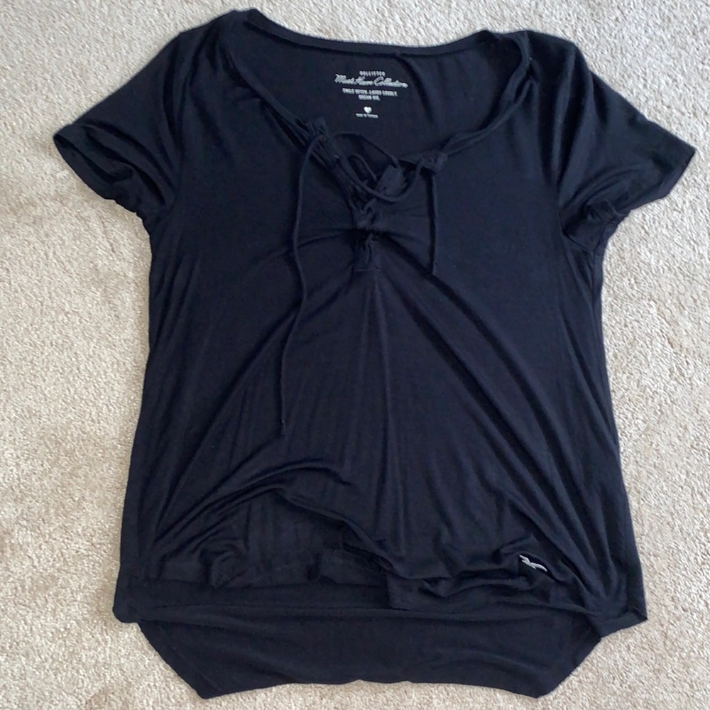 black staple tee